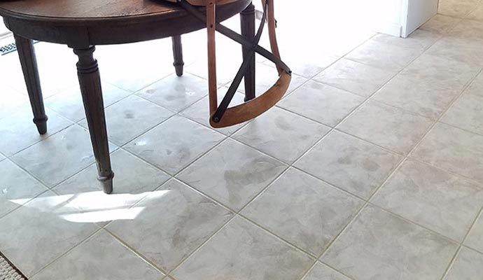 water damaged tile and grout